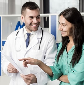 Doctor looks at medical document